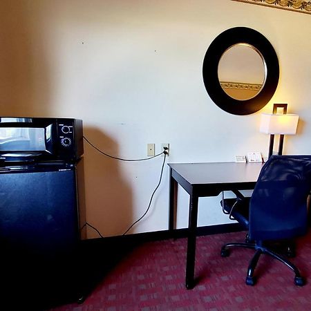 Executive Inn Alva Bagian luar foto