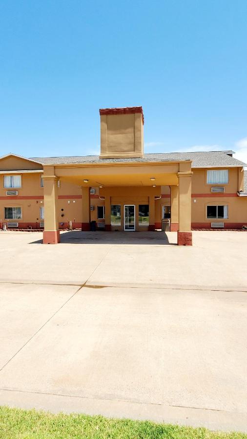 Executive Inn Alva Bagian luar foto