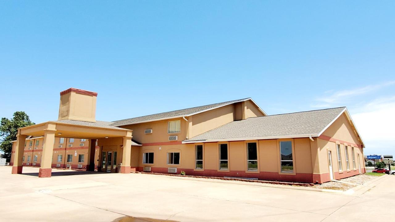 Executive Inn Alva Bagian luar foto