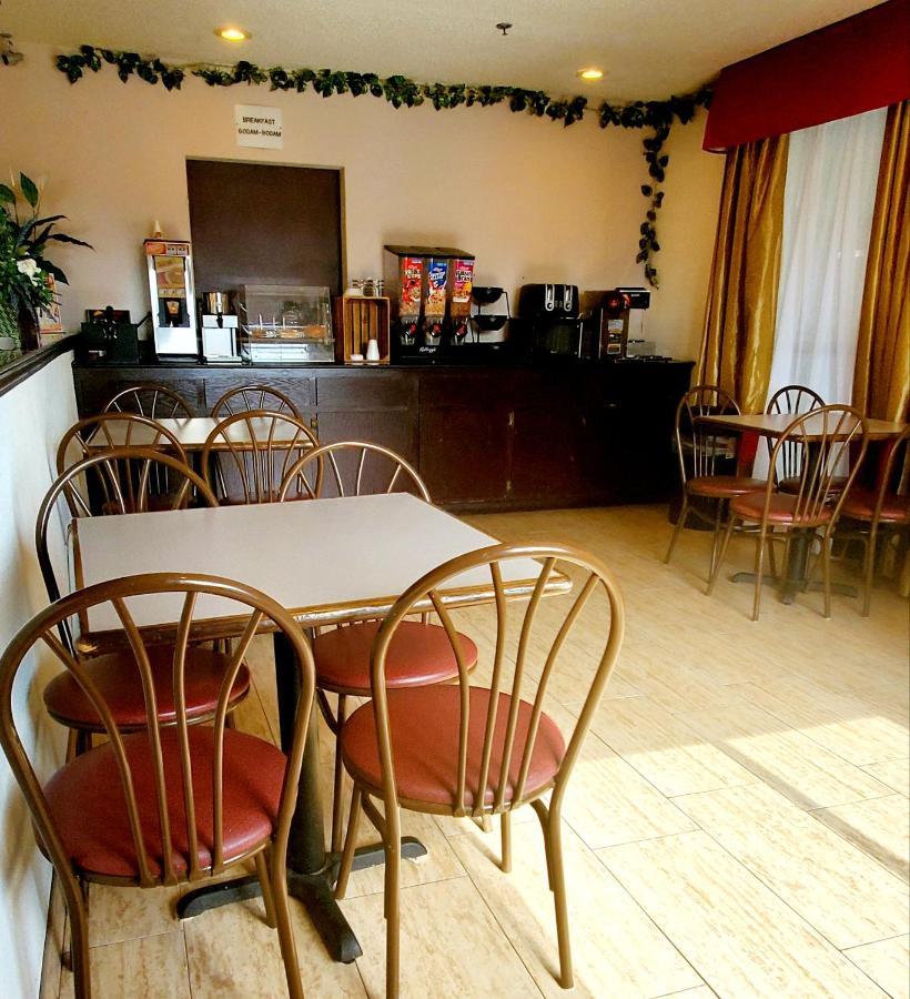 Executive Inn Alva Bagian luar foto