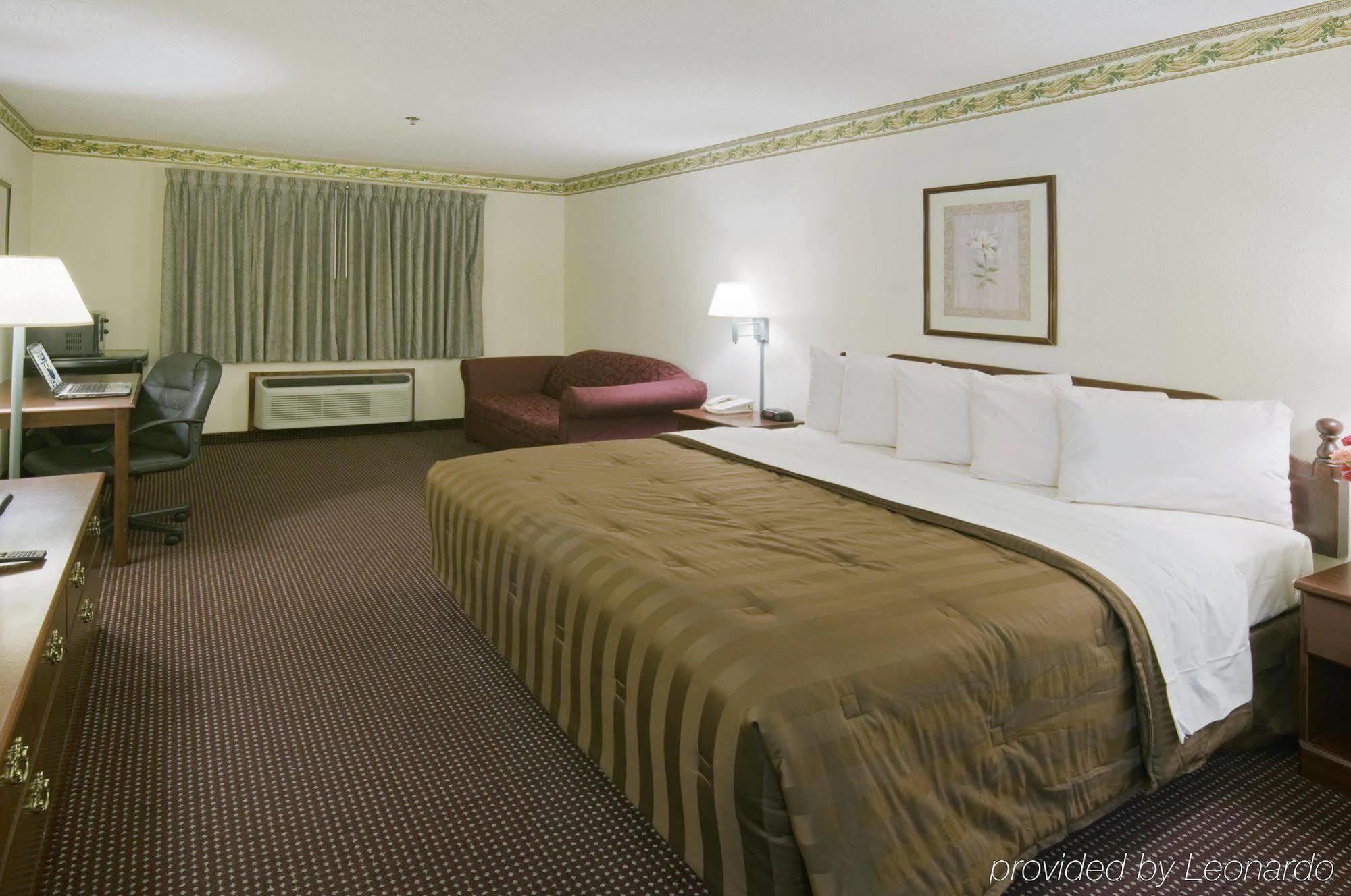 Executive Inn Alva Bagian luar foto