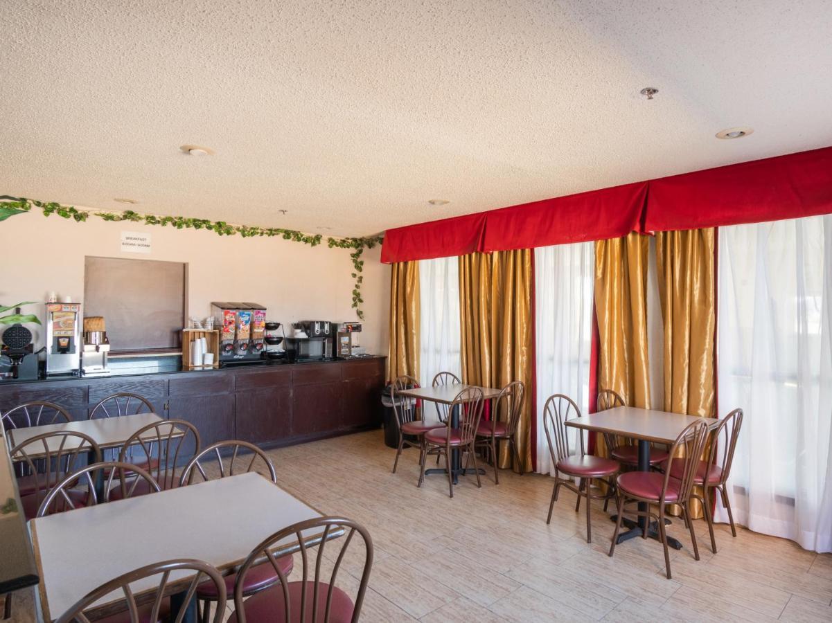 Executive Inn Alva Bagian luar foto